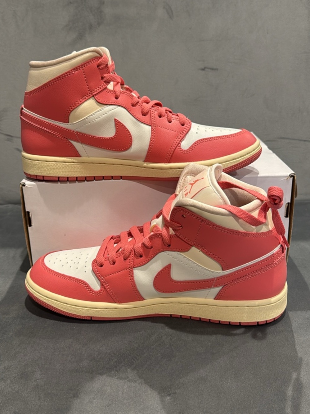 Jordan Women’s High-Top Sneakers in Coral and Cream